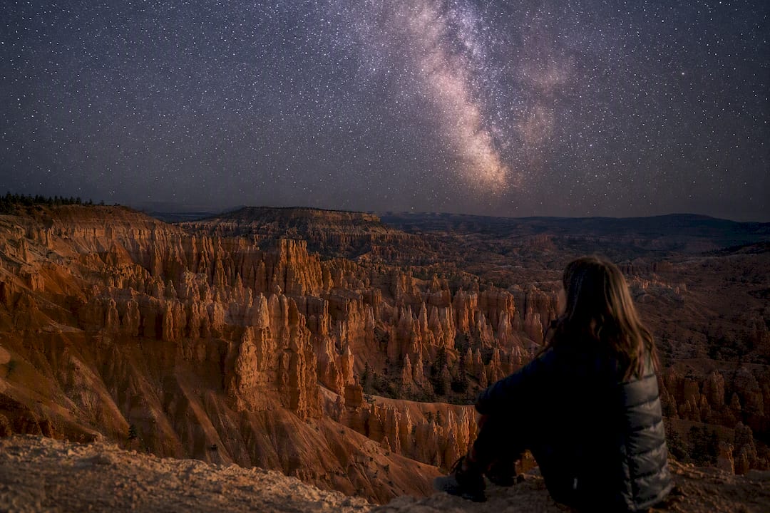 Milky Way arching over Bryce Canyon hoodoos at night